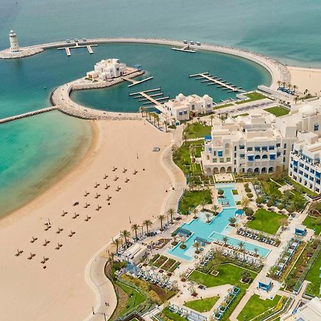 Hilton Salwa Beach Resort And Villas Abu Samra Exterior photo Aerial view of the resort