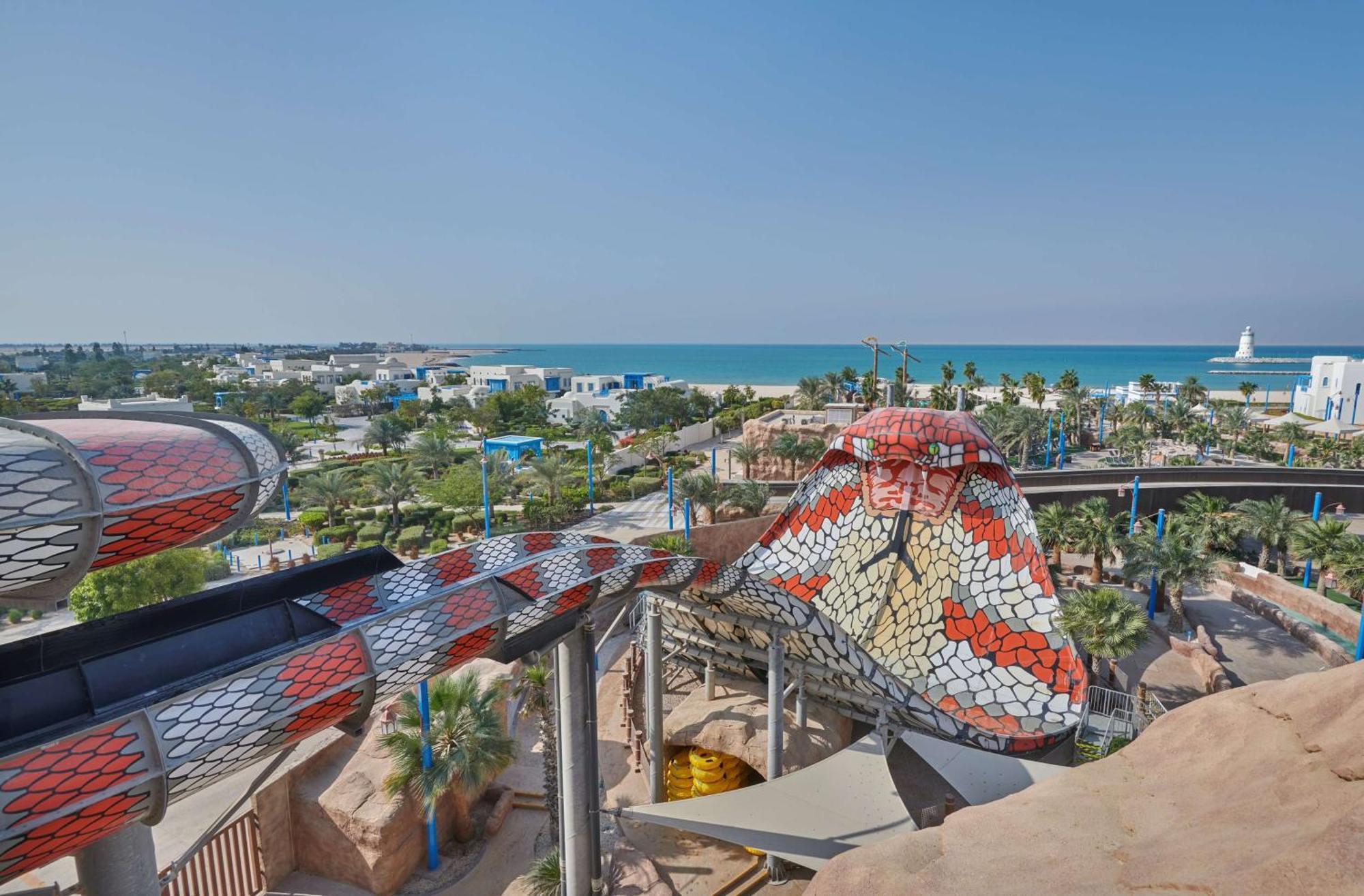 Hilton Salwa Beach Resort And Villas Abu Samra Exterior photo View of the city from the top of the lighthouse