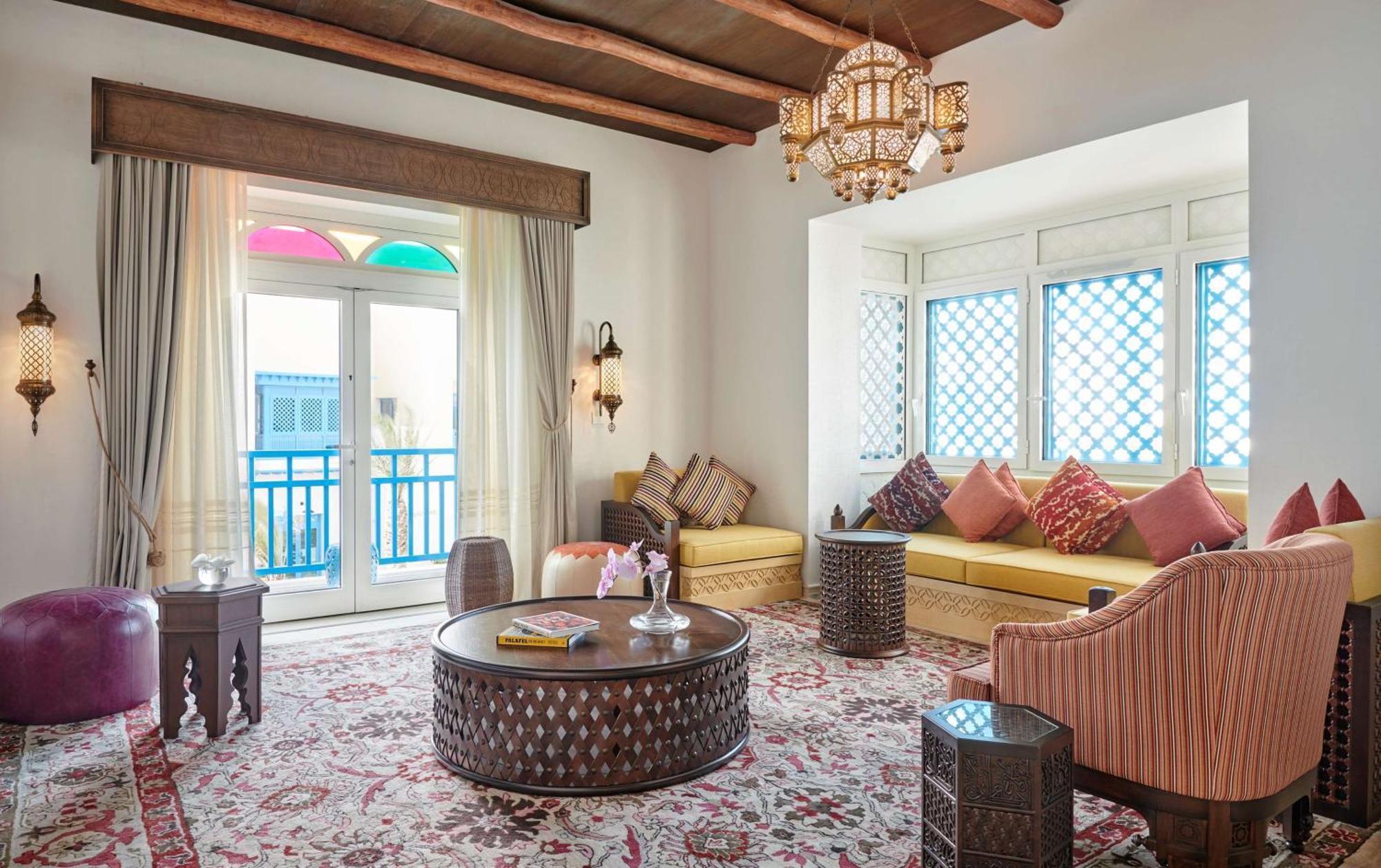 Hilton Salwa Beach Resort And Villas Abu Samra Exterior photo A living room at the hotel