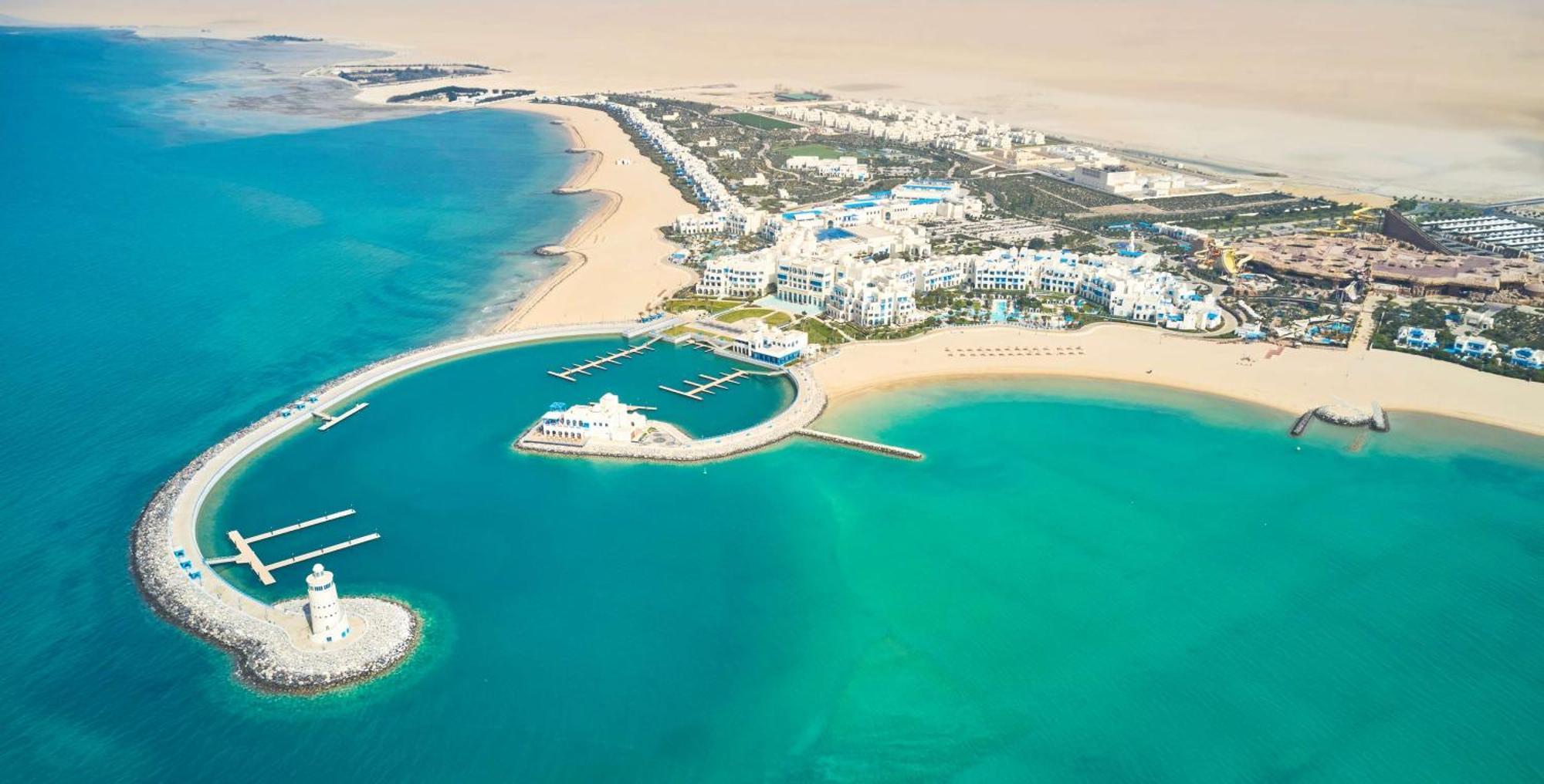 Hilton Salwa Beach Resort And Villas Abu Samra Exterior photo Aerial view of Al Reef Island