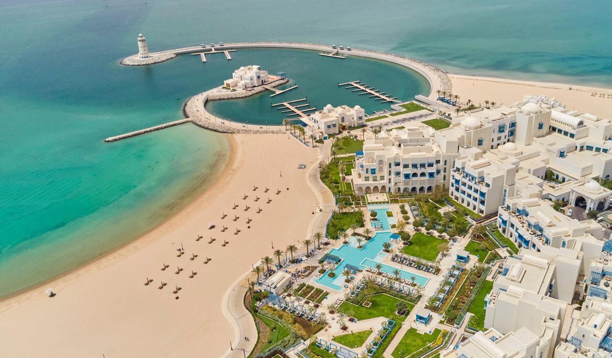 Hilton Salwa Beach Resort And Villas Abu Samra Exterior photo Aerial view of the resort