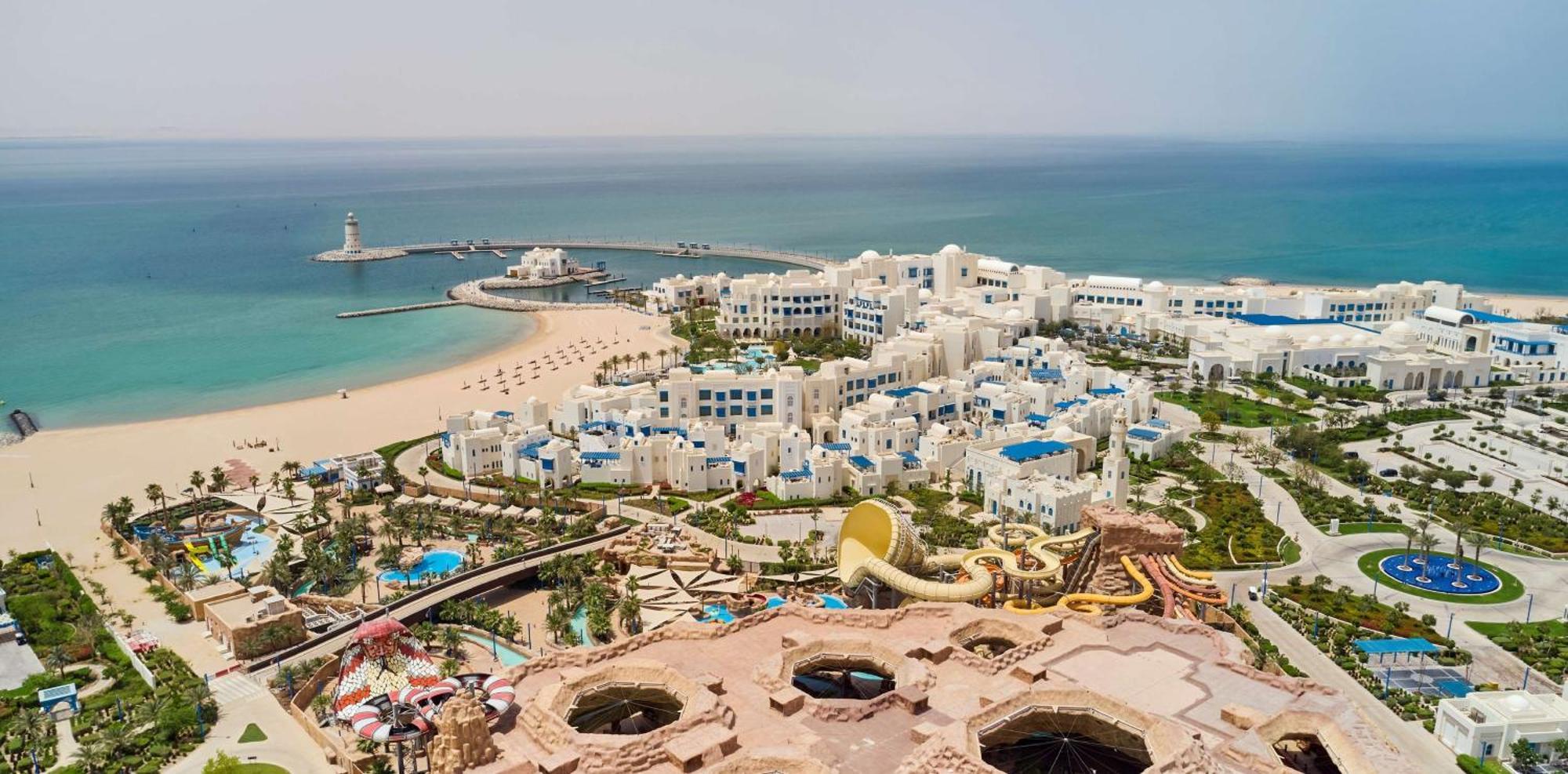 Hilton Salwa Beach Resort And Villas Abu Samra Exterior photo Aerial view of the resort